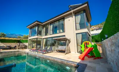 Villa Nur Kalkan Yeşilköy mevkiinde yer alan muhafazakar 2+1 villamız.